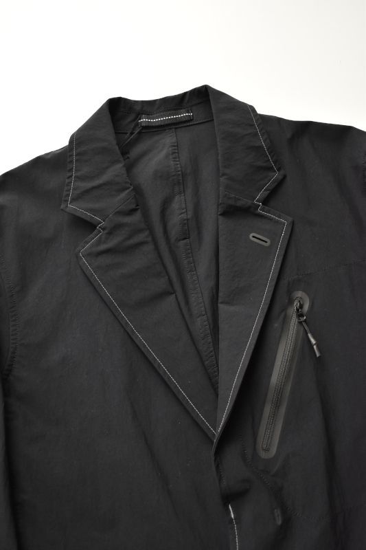 and wander (アンドワンダー) plain tailored stretch jacket [BLACK]