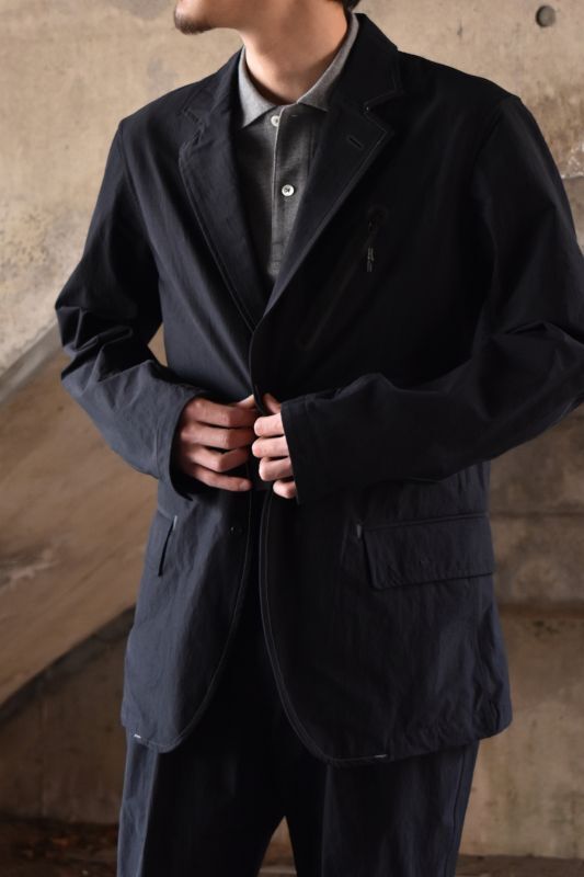 and wander (アンドワンダー) plain tailored stretch jacket [BLACK]